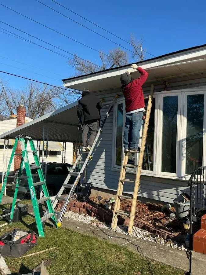 Restoration crew performing exterior repair in Yankee Springs